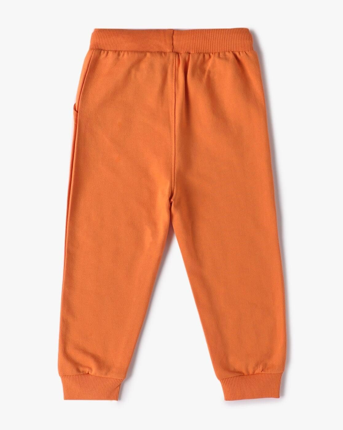 SS25 LION KING JOGGER, ORANGE, 12-18M