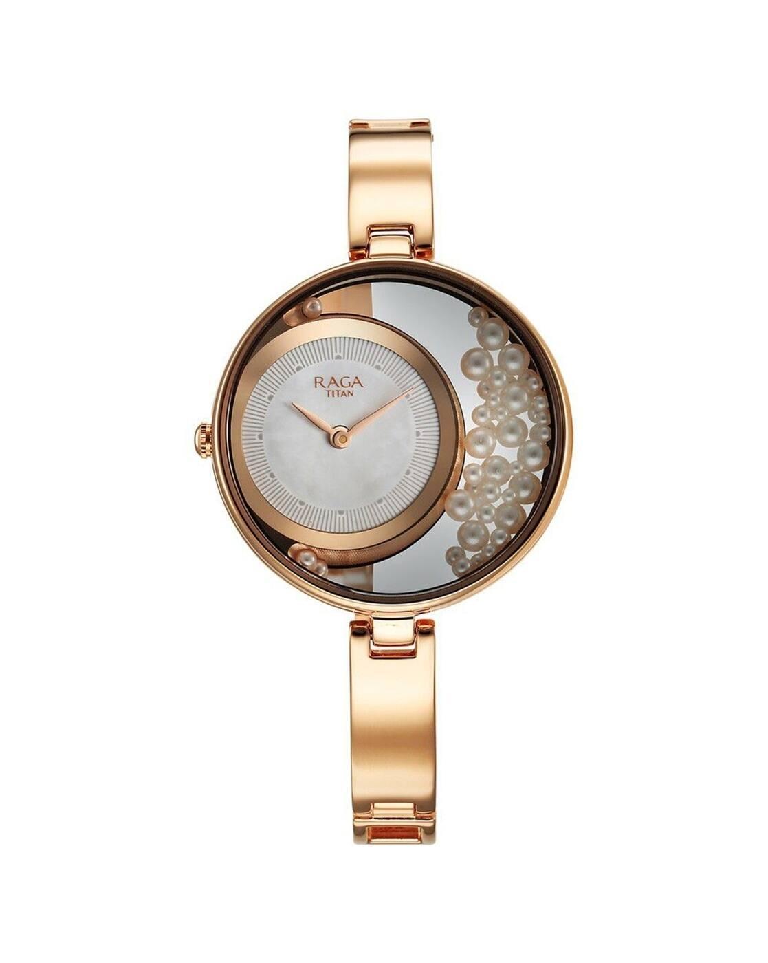 TITAN PWR PEARLS WHT PLAIN 2 HANDS RAGA